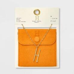 Gold Dipped Scattered Cubic Zirconia Initial Pendant Necklace - A New Day™ Gold -A New Day Shop GUEST e32f0290 0fa8 4cc0 9c37 25a44f76d476